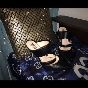 Black strapped high heels